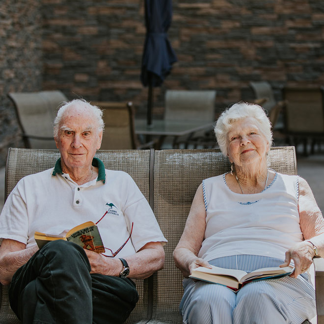 VRS Senior Communities Sunshine Ridge Osoyoos our story tricard1 two happy residents reading